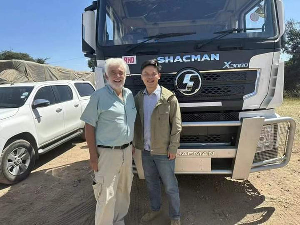Shenbai Sales Team Visits Overseas Client for SHACMAN X3000 Truck Delivery